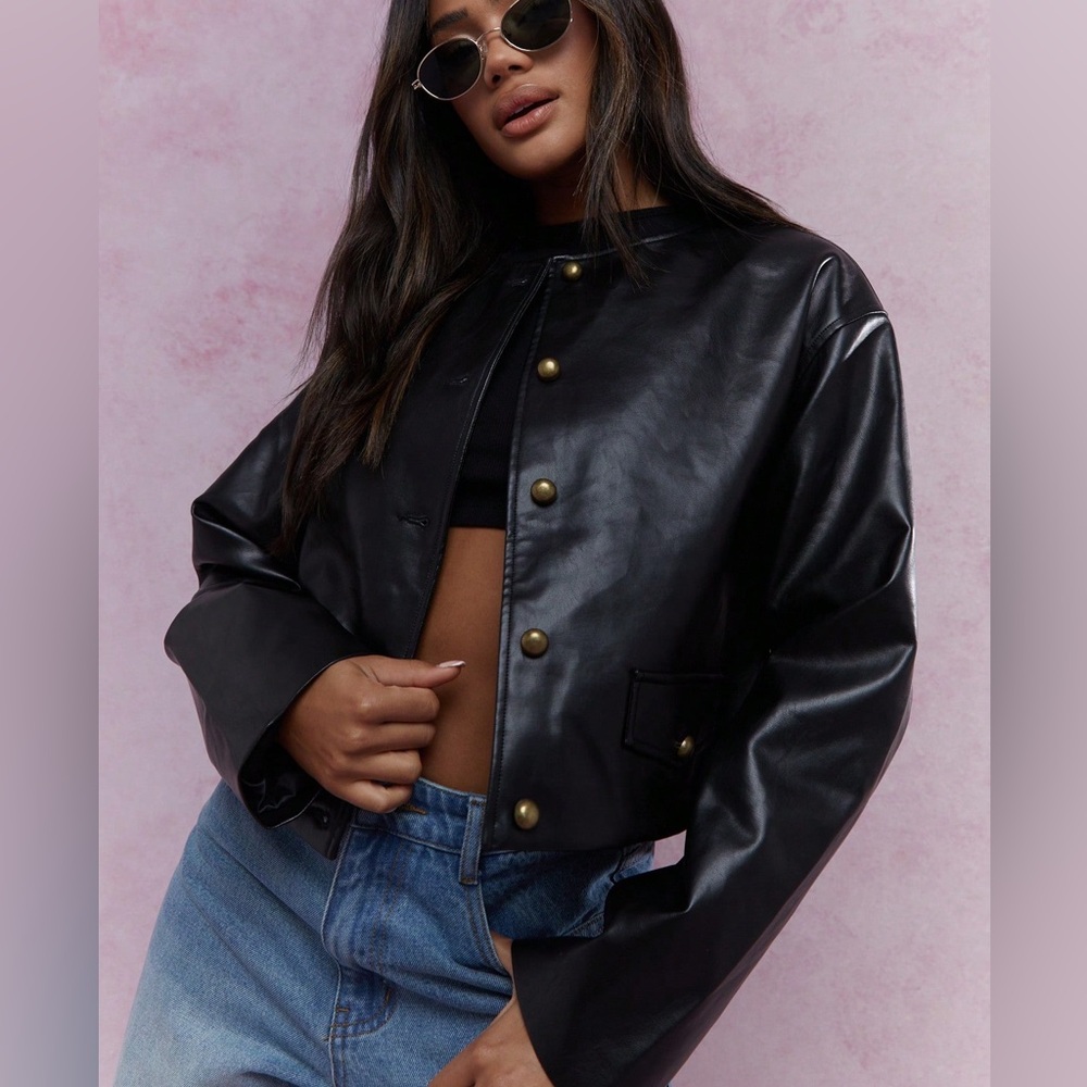 Chic Black Leather Jacket with Gold Accents
